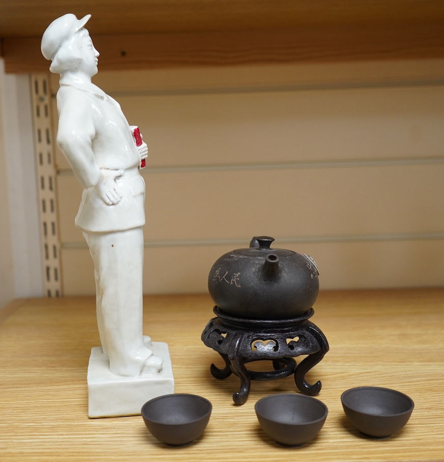 A Chinese cultural revolution Communist party figure together with a Mao teapot and three tea bowls, largest 31cm high. Condition - good